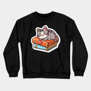 Cute cat sleeping on book Crewneck Sweatshirt